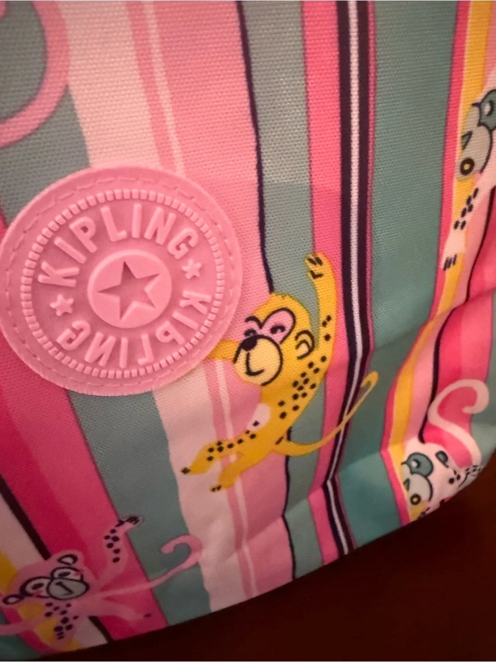 Kipling Pink Teal Multi-Color Striped Monkey Backpack